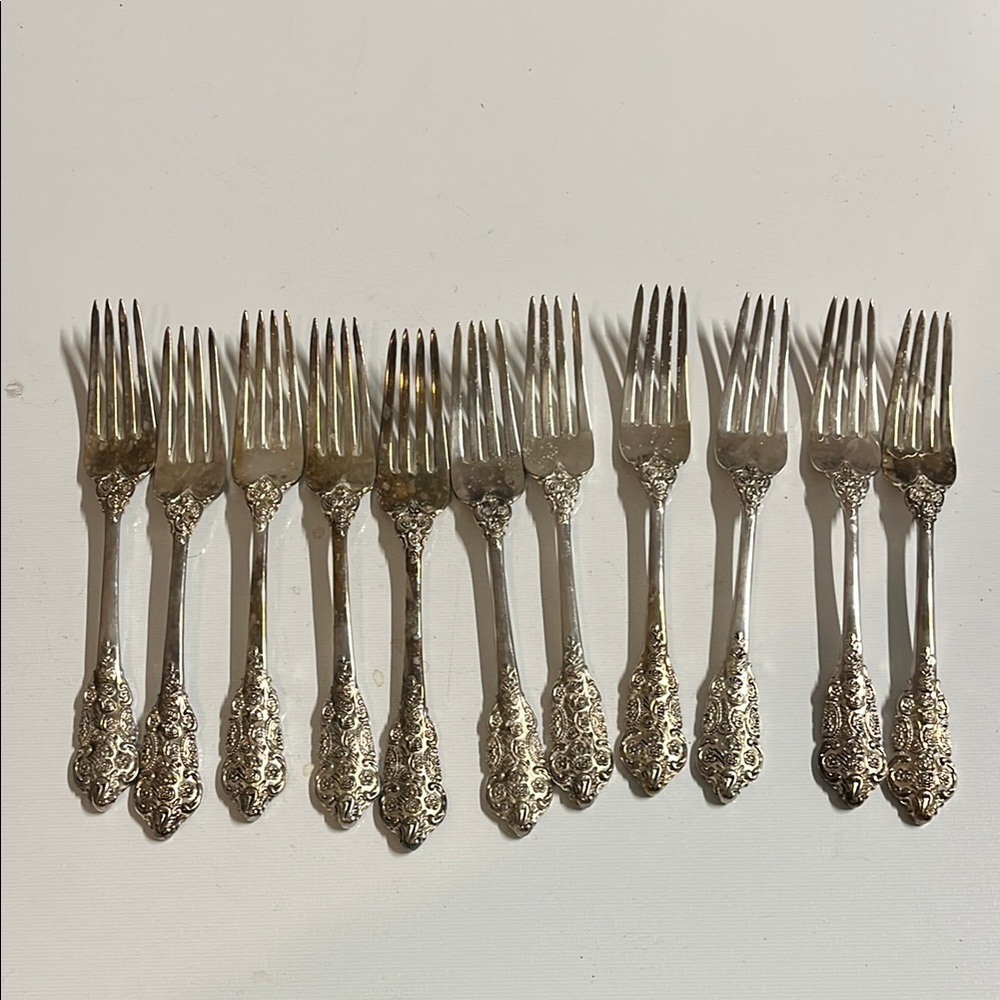 Vintage Silver Flatware Set with Ornate Design